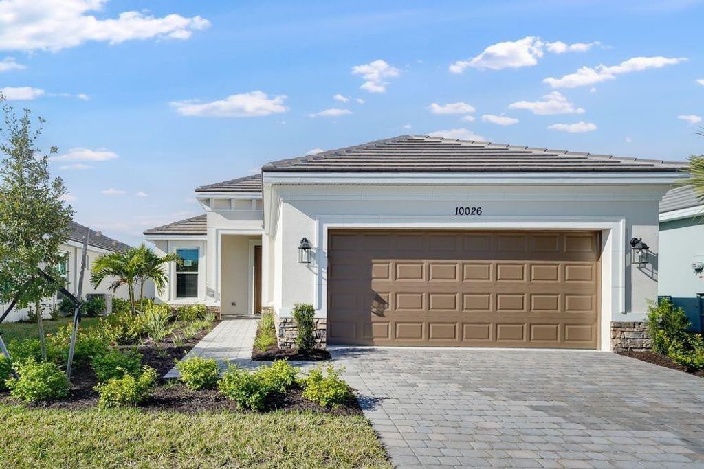 Photo of 10026 SW Arezzo Road, Port Saint Lucie, FL 34987 (MLS # F10508551)