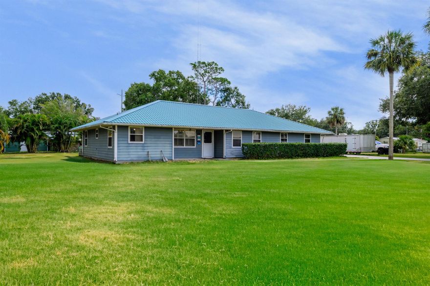 Welcome to your slice of Florida paradise! Nestled on a serene, 1+ acre lot in Pine Ridge Park, this home offers the perfect blend of space and modern convenience, all just minutes from town.Step inside to find a well designed 3-bedroom, 2-bathroom layout, complete with a versatile bonus room perfect for an office or 4th bedroom. You'll love the spacious master suite with its walk-in closet and beautifully updated bathroom. The heart of the home is the updated galley kitchen, featuring ample cabinet space and an extra pantry.  Outside, enjoy the expansive yard, long paved driveway, and storage space.The ultimate bonus? A massive detached 2-bay garage, updated in 2021 with its own bathroom. This area can be used living or entertainment space--ideal for a workshop or man cave.
