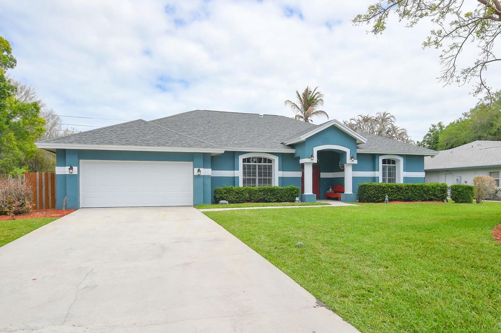 Photo of 2263 NE Marlberry Lane, Jensen Beach, FL 34957 (MLS # B26013560)
