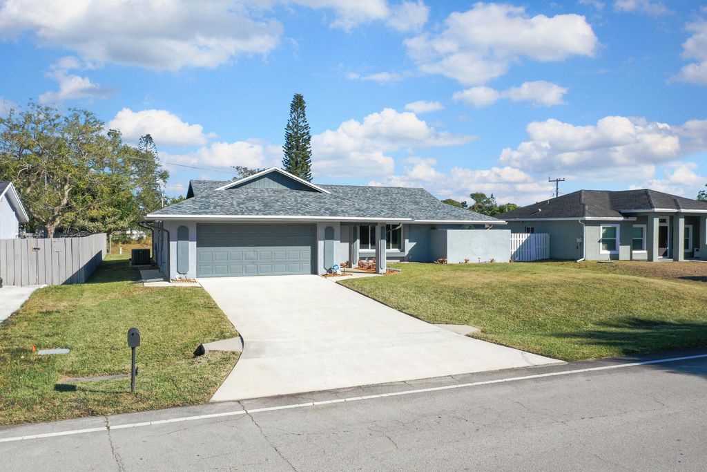 Photo of 121 SE Lakehurst Drive, Port Saint Lucie, FL 34983 (MLS # R11160212)