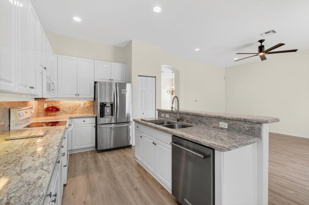 Photo of 7314 Toscane Court, Boynton Beach, FL 33437 (MLS # R11130467)