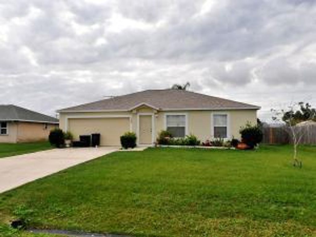 Photo of 142 NW Curtis Street, Port Saint Lucie, FL 34983 (MLS # R10706584)
