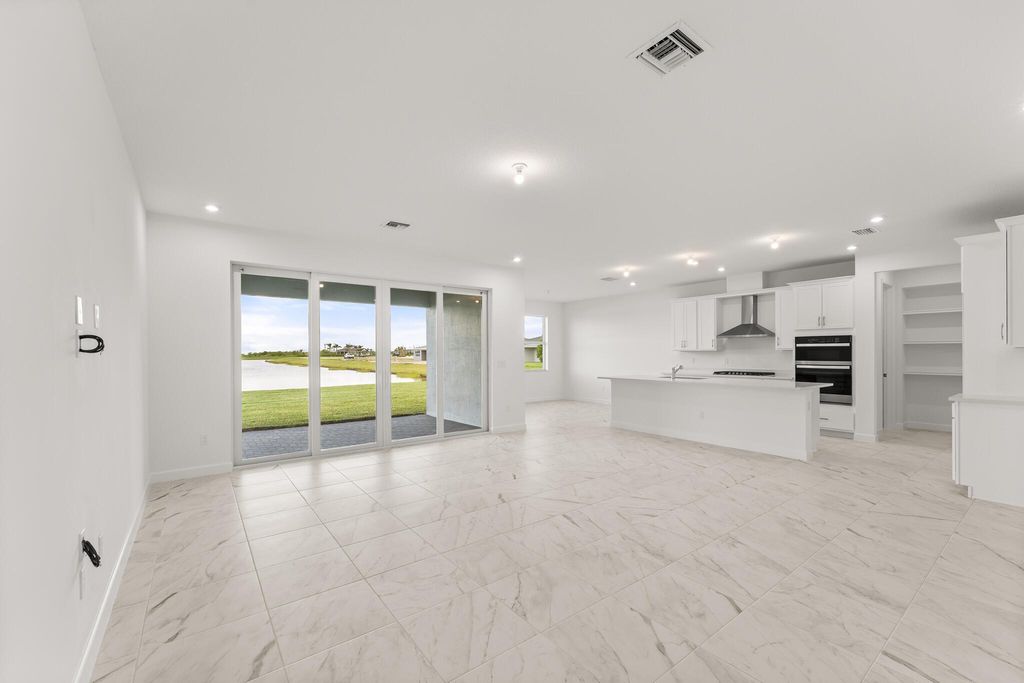 Photo of 13558 SW Bally Drive, Port Saint Lucie, FL 34987 (MLS # R11109572)