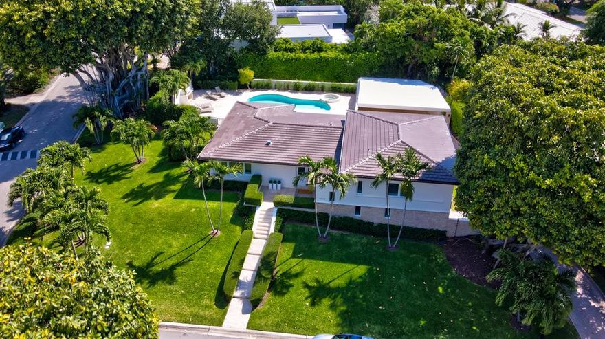 Great opportunity to own in the private and gated community of Bay Point. This home sits on a highly elevated ~17,000 SF lot and is located on the island portion of Bay Point. Upon entrance, you're greeted with an open floor plan featuring views of the pool & luscious backyard. The Master Bedroom is complete with spacious his & her closets and a beautifully renovated Master Bathroom. Two additional bedrooms are met by a Jack & Jill bathroom and the last ensuite bedroom includes a private entrance from outside the home. Updates include a new roof, renovated kitchen, new A/C and full hurricane impact windows & doors. Bay Point offers an amazing location with close proximity to the Design District, Midtown, Miami International Airport, Downtown & some of the best private schools.