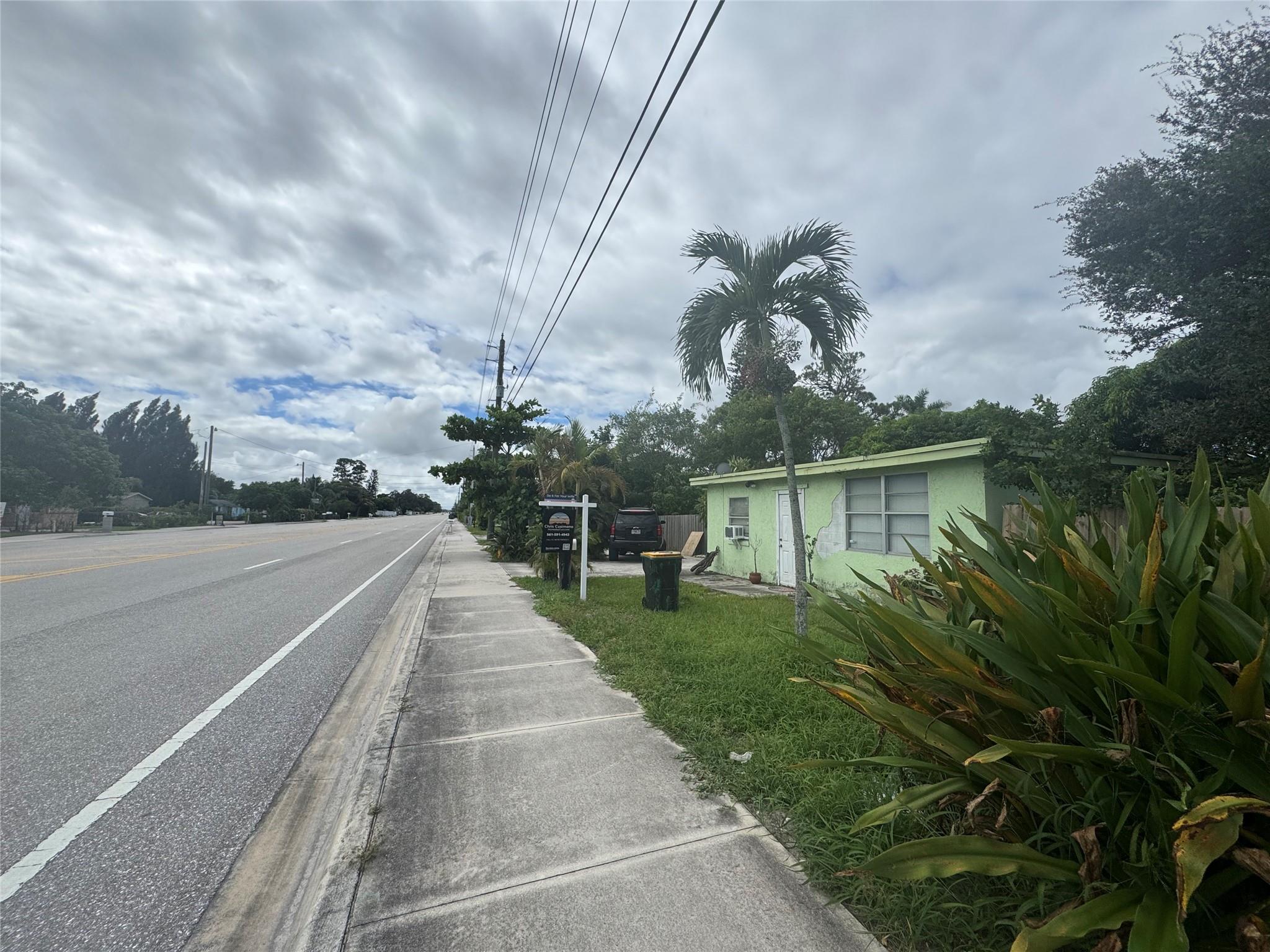 Rare opportunity to own a double lot spanning .53 acres in a sought-after area! This oversized property includes a well-maintained single-family home with a fenced yard, circular driveway, plus existing plumbing and electricity, ready for immediate use or future plans. Whether you move in, rent out, or build new, the options are wide open. Opportunities like this are nearly impossible to find in the area, making this a truly special chance to invest or create your dream home.