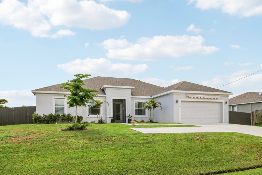 Photo of 1016 SW Paar Drive, Port Saint Lucie, FL 34953 (MLS # B26076946)