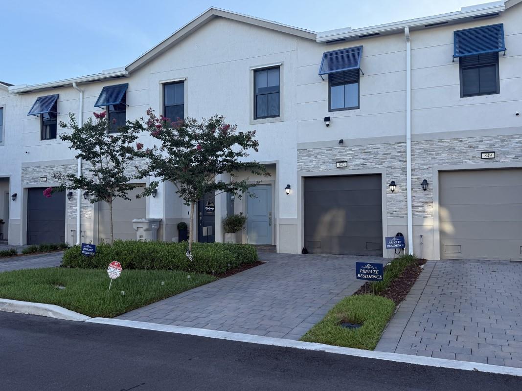 2024-built modern townhome: 3BR/2.5BA with open-concept living and abundant light. Chef’s kitchen boasts quartz countertops, a large island seating 4, and stainless-steel refrigerator, range, microwave, and dishwasher. Primary suite features a spacious bedroom, walk-in closet, and beautifully updated showers. In-unit washer & dryer, electric water heater, and whole-home water filtration. 1-car garage + driveway parking. Fresh, stylish, and move-in ready—tour today! Near shopping, dining & highways. Hurry!