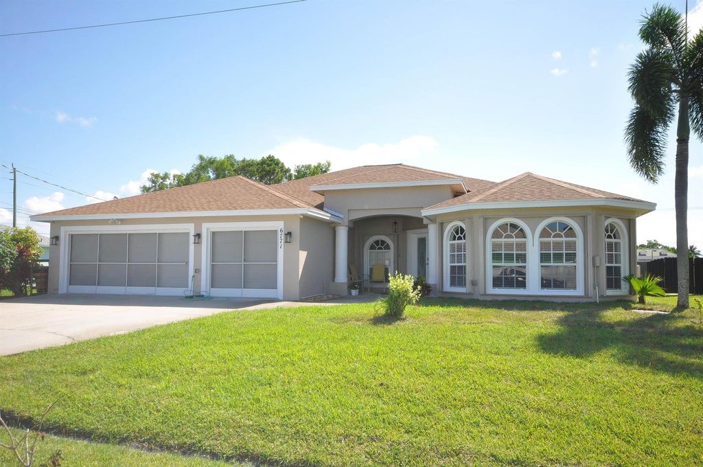Photo of 6771 NW Daffodil Lane, Port Saint Lucie, FL 34983 (MLS # R11099961)