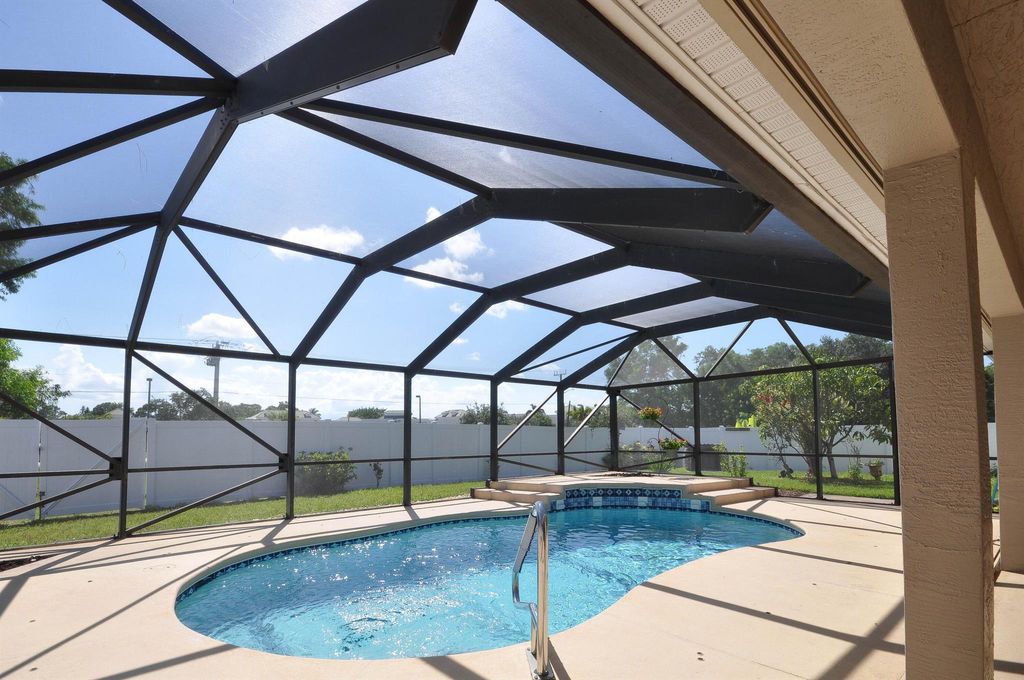 Photo of 6771 NW Daffodil Lane, Port Saint Lucie, FL 34983 (MLS # R11099961)