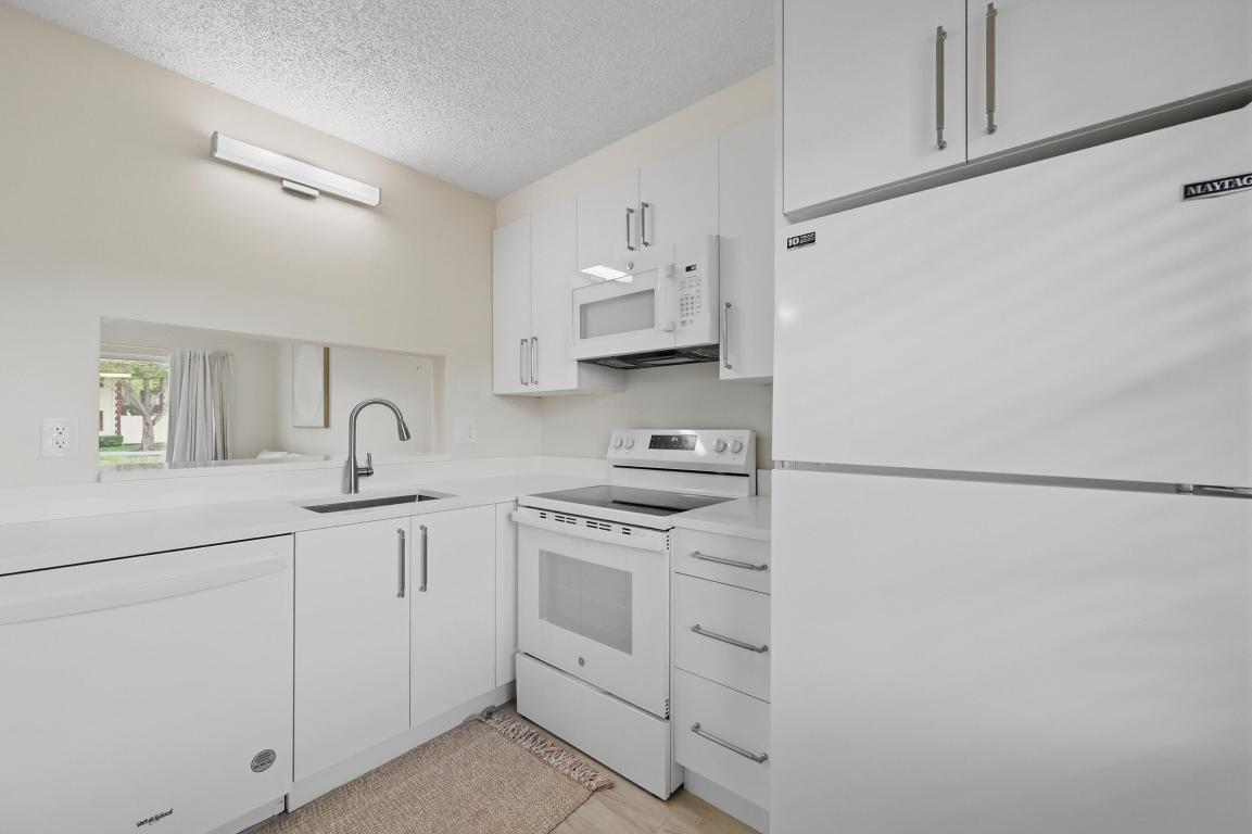 HOLIDAY VILLAGE OF CORAL SPRINGS - Residential