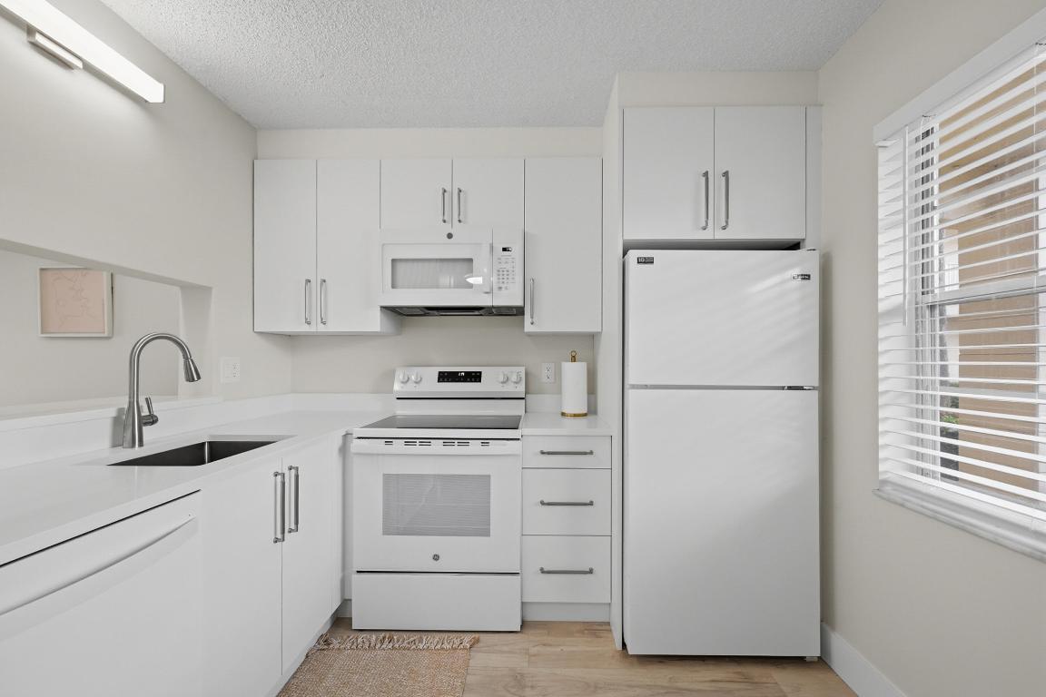 HOLIDAY VILLAGE OF CORAL SPRINGS - Residential