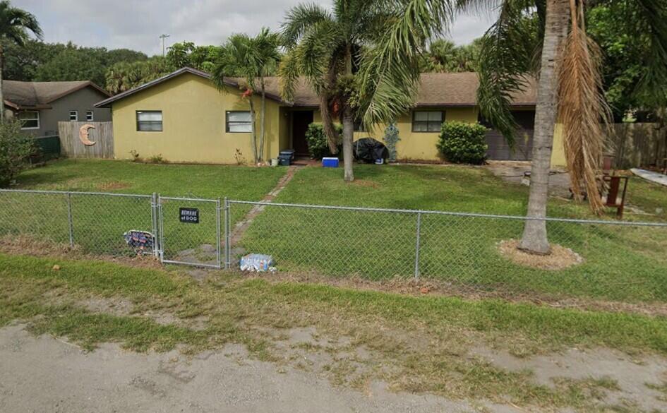 Photo of 6663 Rigger Road, Lake Worth, FL 33462 (MLS # B26054849)