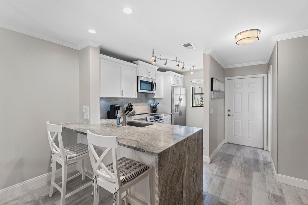 Photo of 9421 S Ocean Dr #88, Jensen Beach, FL 34957 (MLS # R10966036)