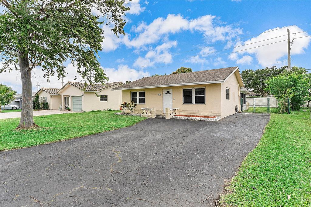 Photo of 9804 NW 70th Street, Tamarac, FL 33321 (MLS # B26012726)