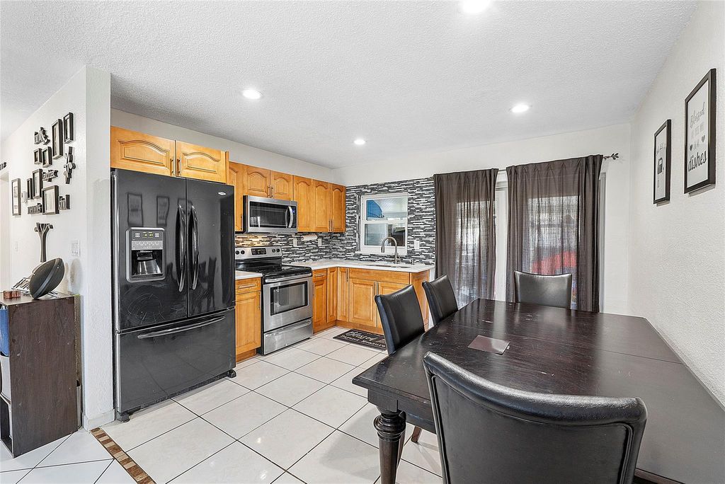 Photo of 9804 NW 70th Street, Tamarac, FL 33321 (MLS # B26012726)