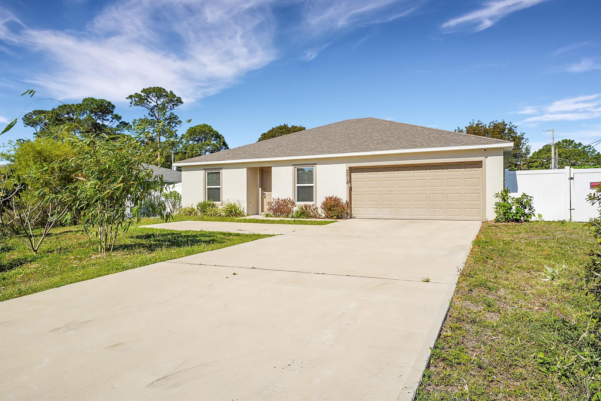 3 bedroom, 2 bath, 2 car garage, split floor plan, fenced in yard. Newly built home, 3 years old, well maintained, with hurricane impact windows and a under roof Florida room that is 10 x 30, 320 sq. ft. along with an under roof screened in porch. Kitchen with pantry and breakfast bar, stainless steel appliances, inside laundry room with washer and dryer. Lot is 1/4 acre fenced in yard with room for a pool and activities, with fruit trees.Convenient location close to I95, Turnpike, shopping, schools, medical facilities, parks.