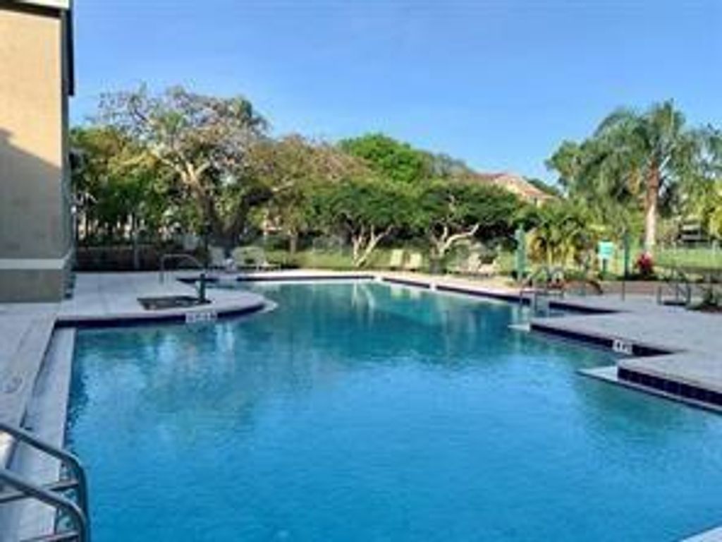 Photo of 1705 Palm Cove Blvd Blvd #301, Delray Beach, FL 33445 (MLS # F10339935)