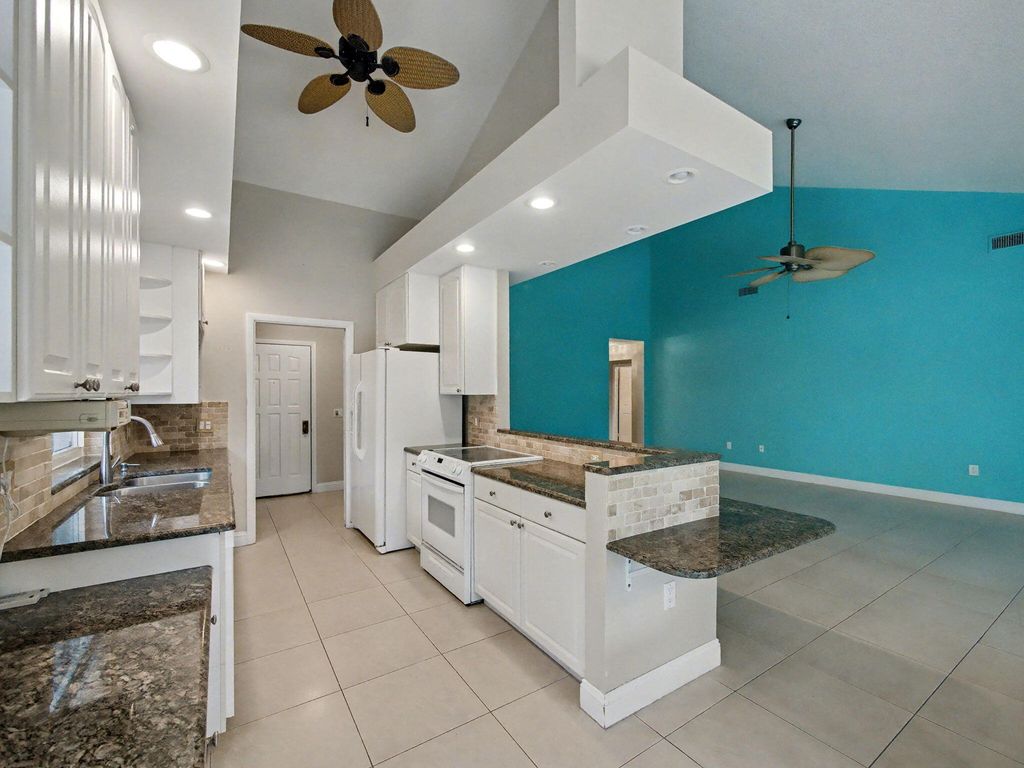 Photo of 303 Leeward Drive, Jupiter, FL 33477 (MLS # B26014464)