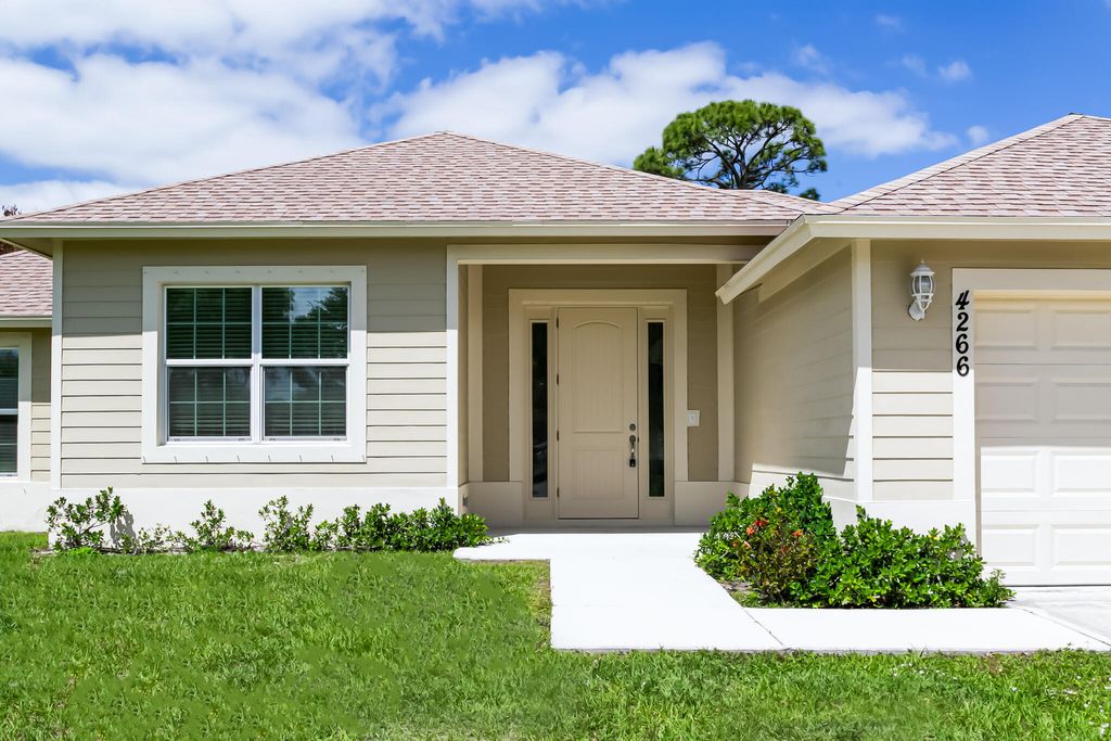 Photo of 4266 SW Mcclellen Street, Port Saint Lucie, FL 34953 (MLS # B26017387)