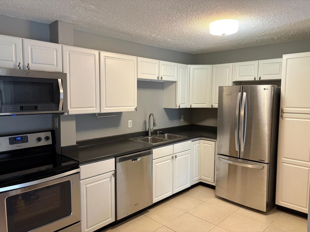 Photo of 1111 Duncan Circle #101, Palm Beach Gardens, FL 33418 (MLS # R11037991)
