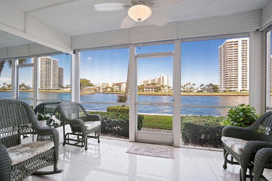 Enjoy Million Dollar intracoastal views and waterfront living at its finest in this stunning fully renovated condo. This 2 BR, 2 BA condo w/ covered parking has been completely redesigned w/ a versatile sliding wall/door allow you convert the large open living area to a private second bedroom with Murphy bed and en-suite bathroom while the master suite offers dual vanities and a fog-free lighted mirror.  Fabulous attention to detail with a custom designed kitchen w/Viking appliances, polished 24'' x 48'' tile flooring and custom tray ceilings throughout with recess lighting. Watch the yachts parade by as you relax on your private patio, or drop a line and fish right out your back door. Buildings painted 2025.
Ports O Call is an active 55+ community includes  pool, gym and clubhouse. Boat slips available for rent, up to 24 ft, for $1,000 per year, current waitlist.  Conveniently located to shopping, dining, golfing including North Palm Beach Country Club, Safe Harbor Marina, beaches & airports.