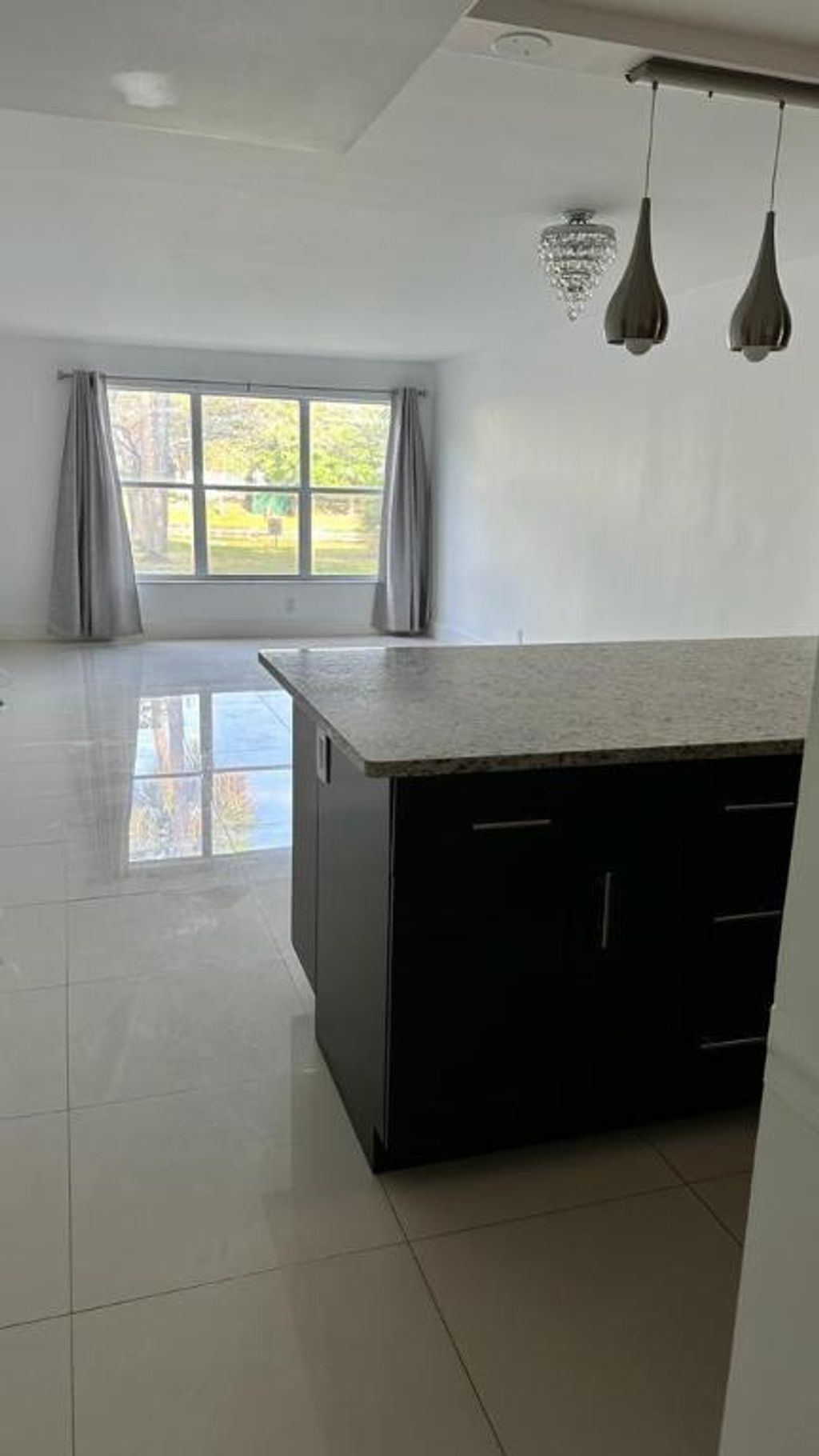 Photo of 2306 S Cypress Bend Drive #121, Pompano Beach, FL 33069 (MLS # R10975515)