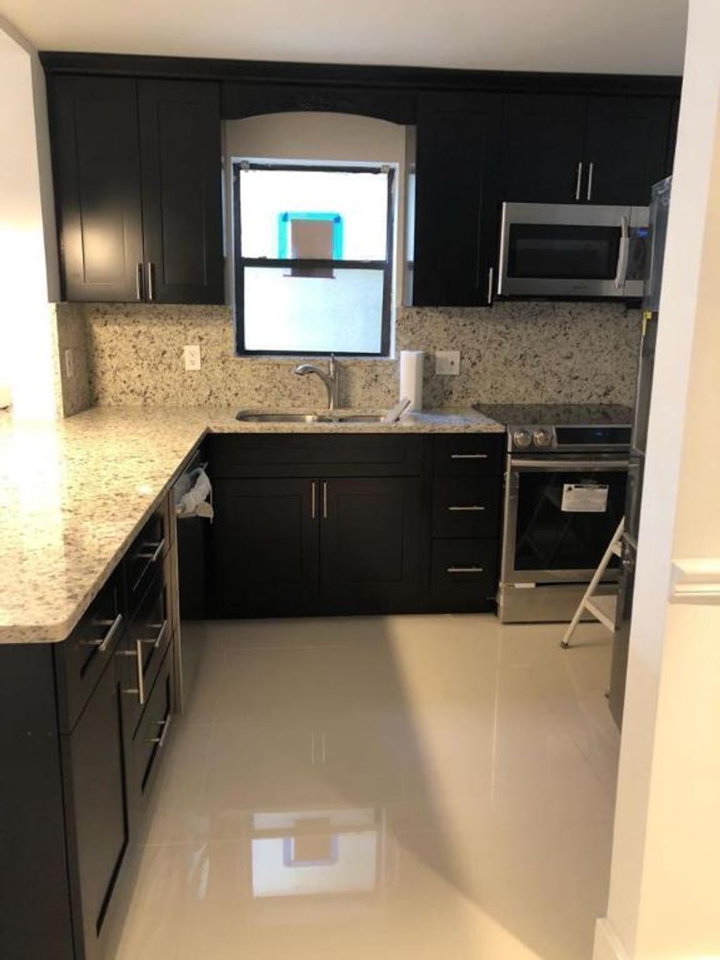 Photo of 2306 S Cypress Bend Drive #121, Pompano Beach, FL 33069 (MLS # R10975515)