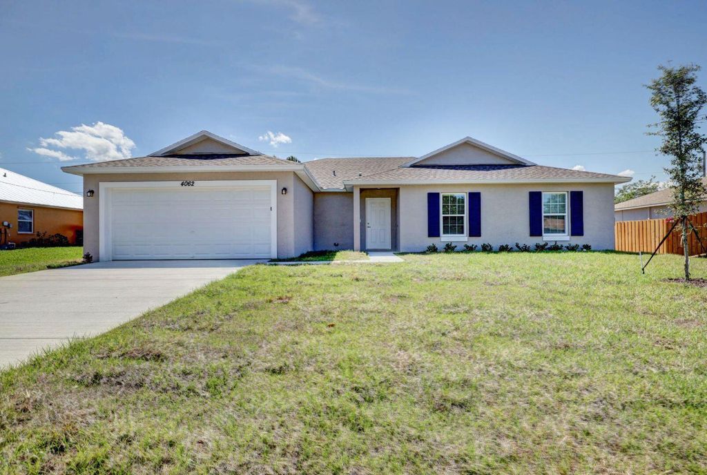 Photo of 5737 NW Jigsaw Lane, Port Saint Lucie, FL 34986 (MLS # B26006694)