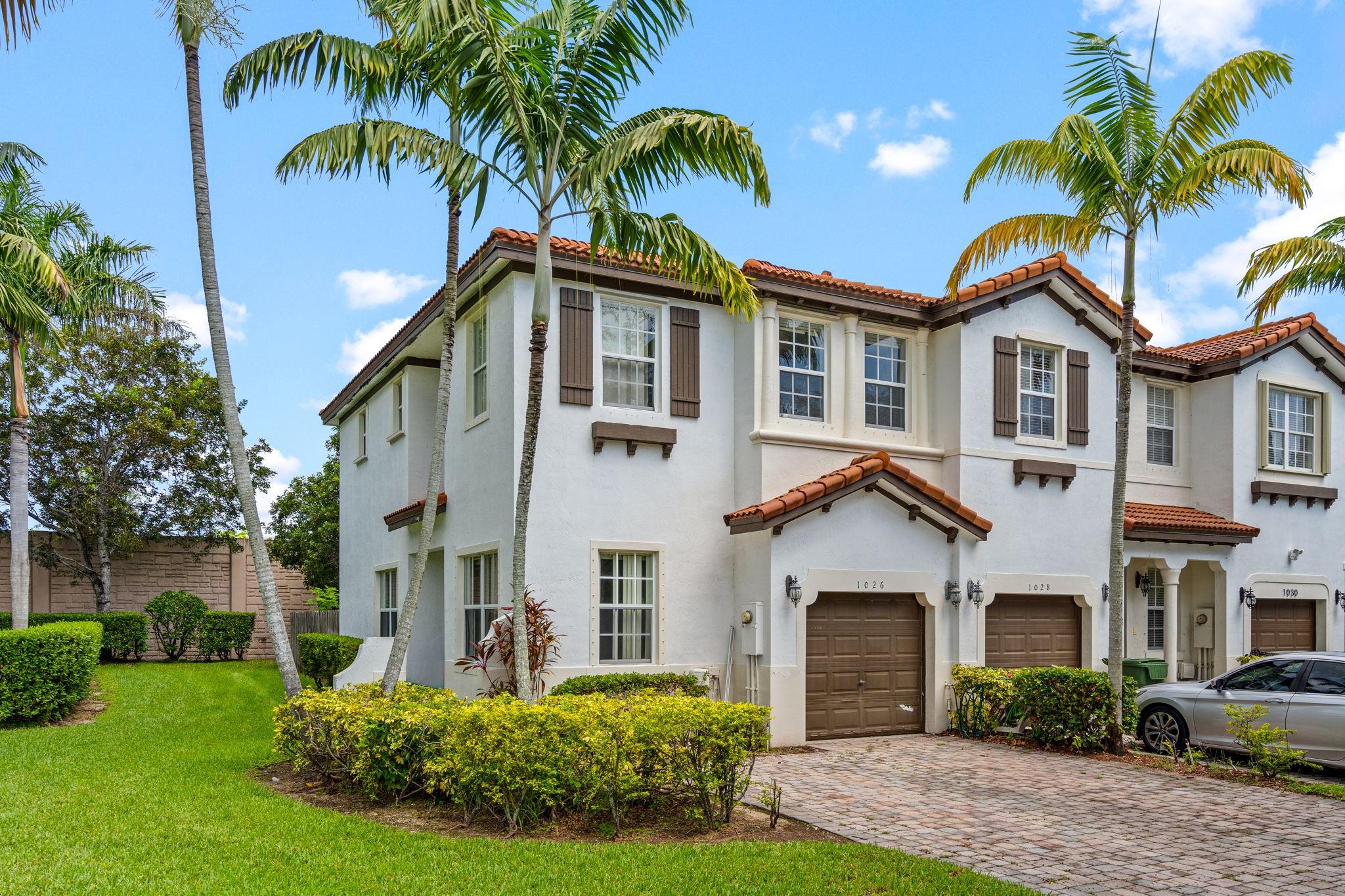 A corner unit, 2-story townhouse with 1-car garage located in Villas at Portofino, a private gated community. This bright and freshly painted home offers 3 bedrooms and 2.5 bathrooms, including a very large first-floor living area. The upgraded kitchen boasts newer appliances, real wood cabinets, granite countertops, and an open layout connecting to the dining/family room. Ceramic tile floors on the first level and real wood floors provide comfort throughout the upstairs bedrooms. An oversized primary suite with a walk-in closet. Patio is paved and fenced for privacy. Community amenities include a pool, gated entry and roaming security. The property is ideally located near Homestead Hospital, Publix, CVS, Walgreens, fitness centers, popular restaurants, shopping, and A-rated schools.
