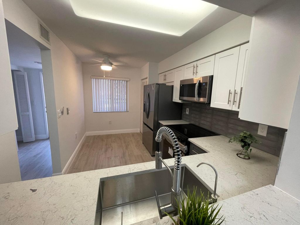Photo of 14111 Royal Vista Drive #202, Delray Beach, FL 33484 (MLS # B26031607)