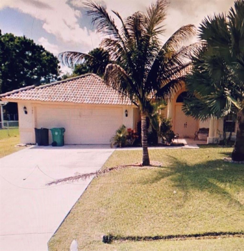 Photo of 562 SW Dairy Rd, Port Saint Lucie, FL 34953 (MLS # F10276763)