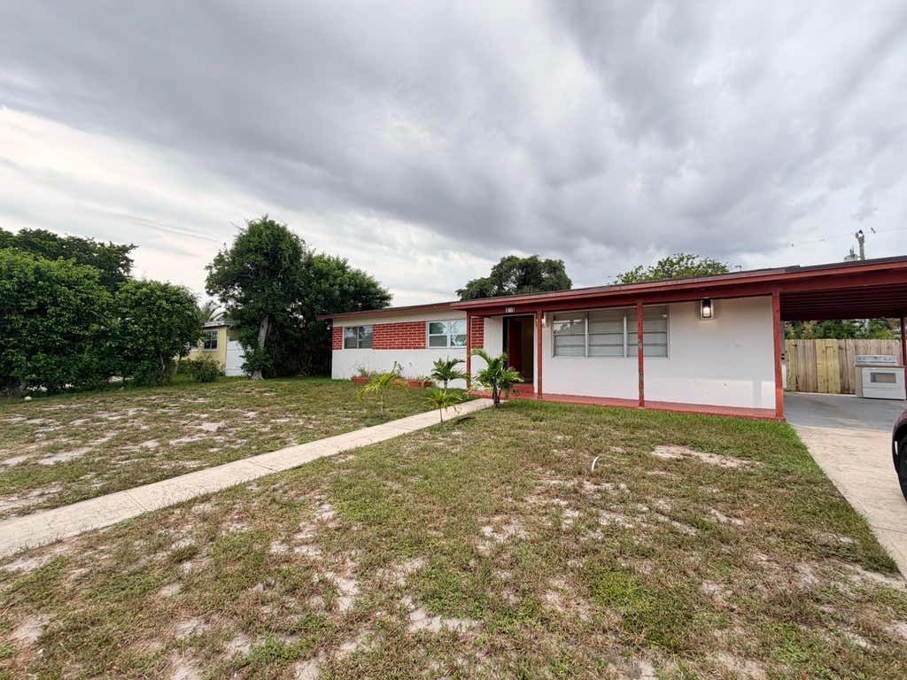 Photo of 121 N 12TH Street, Lantana, FL 33462 (MLS # B26054427)