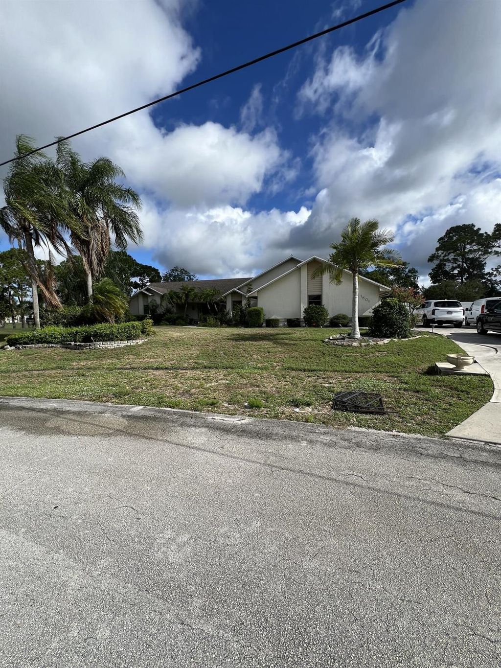 Photo of 1501 SE Blockton Avenue, Port Saint Lucie, FL 34952 (MLS # R11000517)
