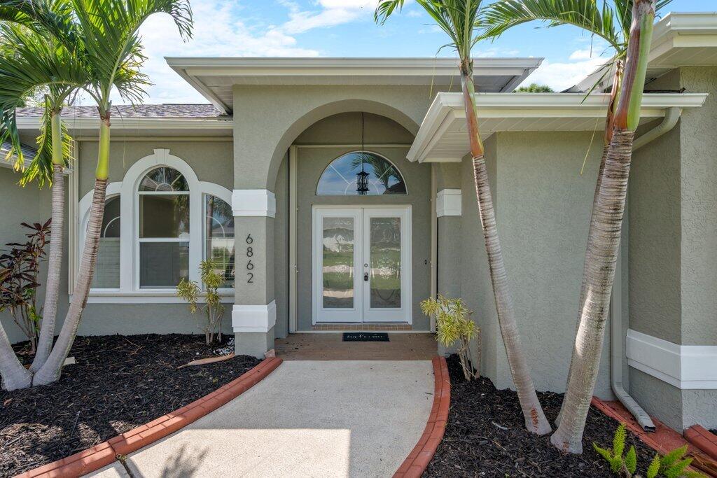 Photo of 6862 NW Jorgensen Road, Port Saint Lucie, FL 34983 (MLS # B26074973)