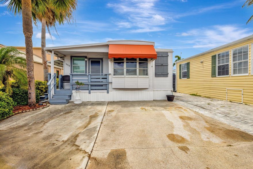 Charming island bungalow located in one of Hutchinson Island's most vibrant, gated communities.  Imagine yourself embracing a breezy lifestyle with access to 2 sparkling pools, private beach access, and an array of recreational activities. Whether you enjoy mini golf, pickleball, tennis, shuffleboard, or bocce, this community has it all! Plus, you'll love the convenience of having a commercial marina and being just a stroll away from Sauder's Landing and the Village Grocery.  Living here feels like being at a resort, but even better - because you get to call it home!