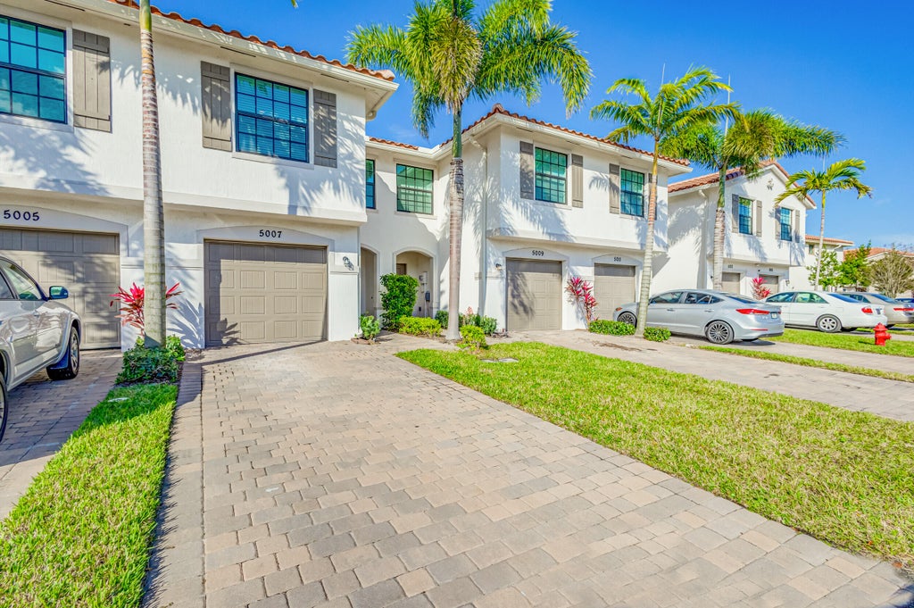 Photo of 5007 Woods Edge Circle, Riviera Beach, FL 33410 (MLS # R10962746)
