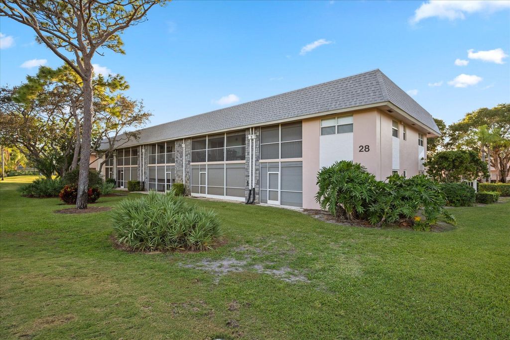 Photo of 18081 SE Country Club Drive #277 Building 28, Jupiter, FL 33469 (MLS # R10935923)