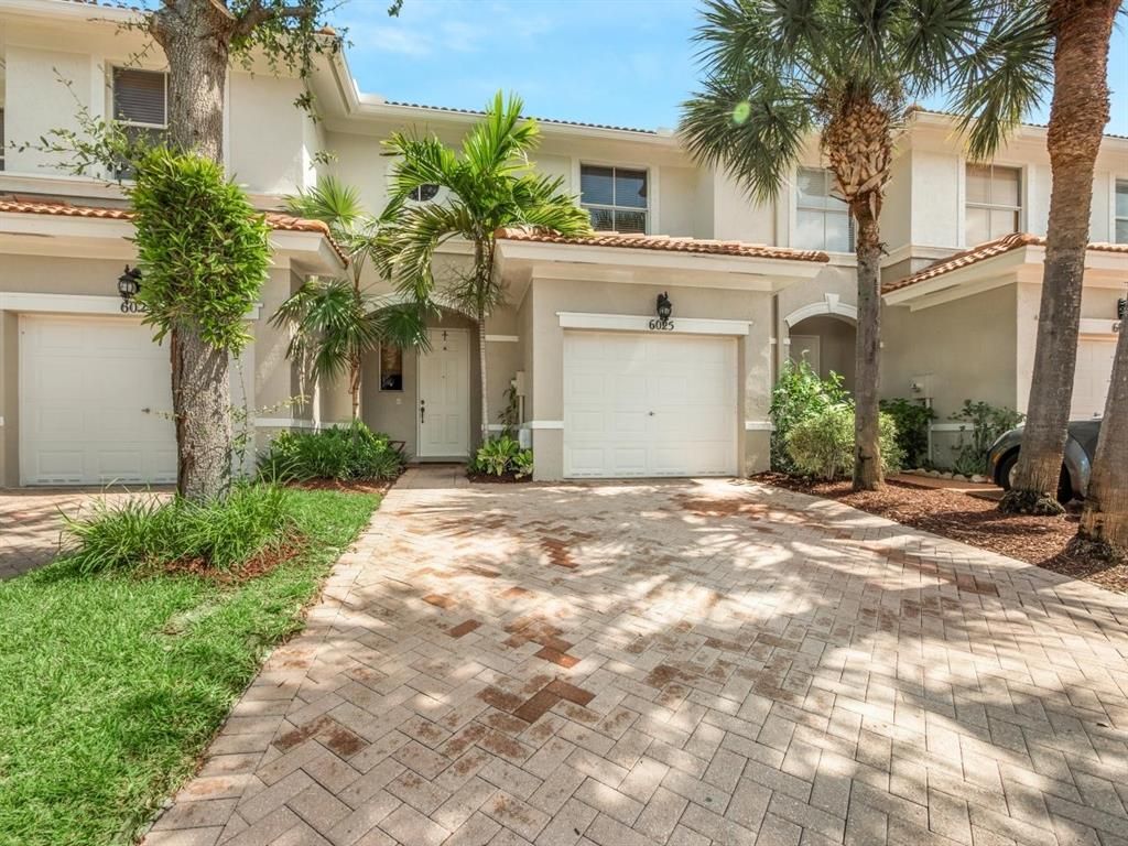 Photo of 6025 Seminole Gardens Circle, Riviera Beach, FL 33418 (MLS # R10734639)