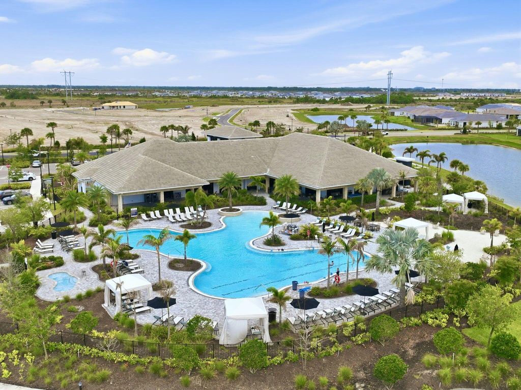 Photo of 9953 SW Arezzo Road, Port Saint Lucie, FL 34987 (MLS # B26019635)