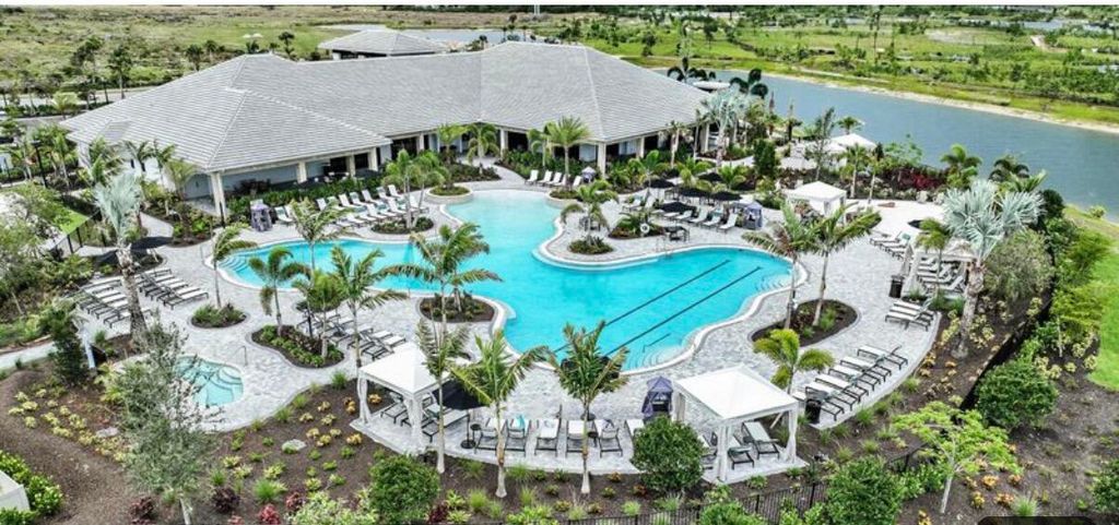 Photo of 9953 SW Arezzo Road, Port Saint Lucie, FL 34987 (MLS # B26019635)