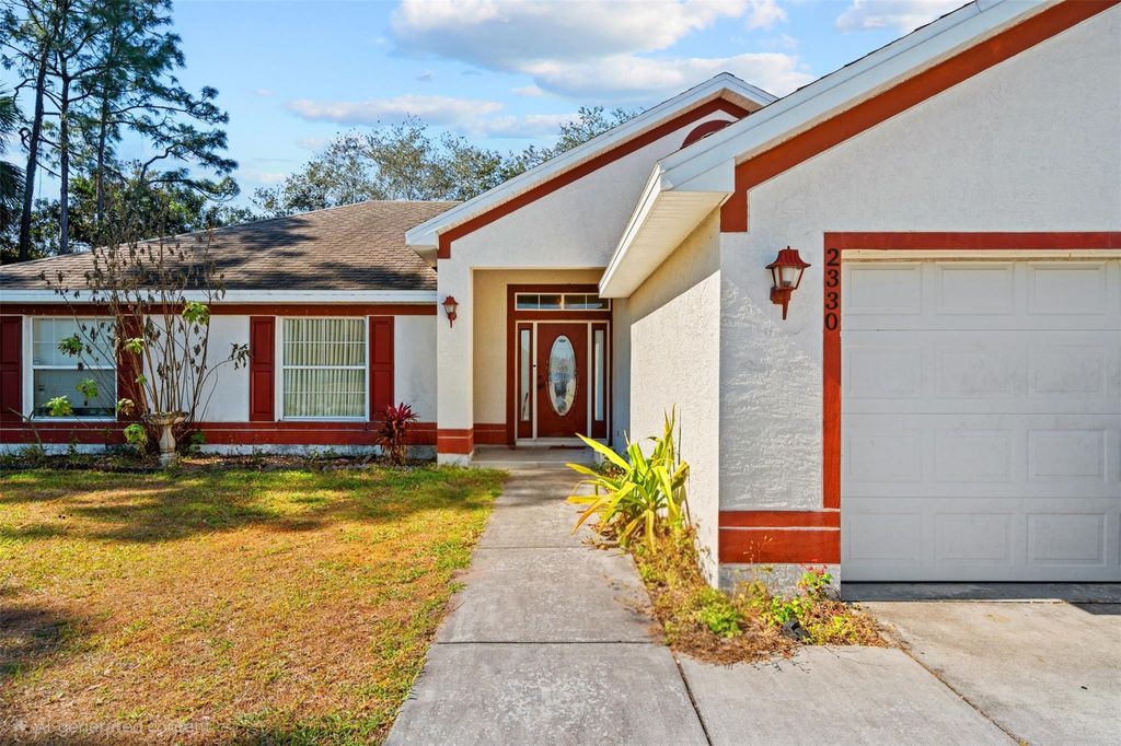 Photo of 2330 SW Neal Road, Port Saint Lucie, FL 34953 (MLS # F10551454)