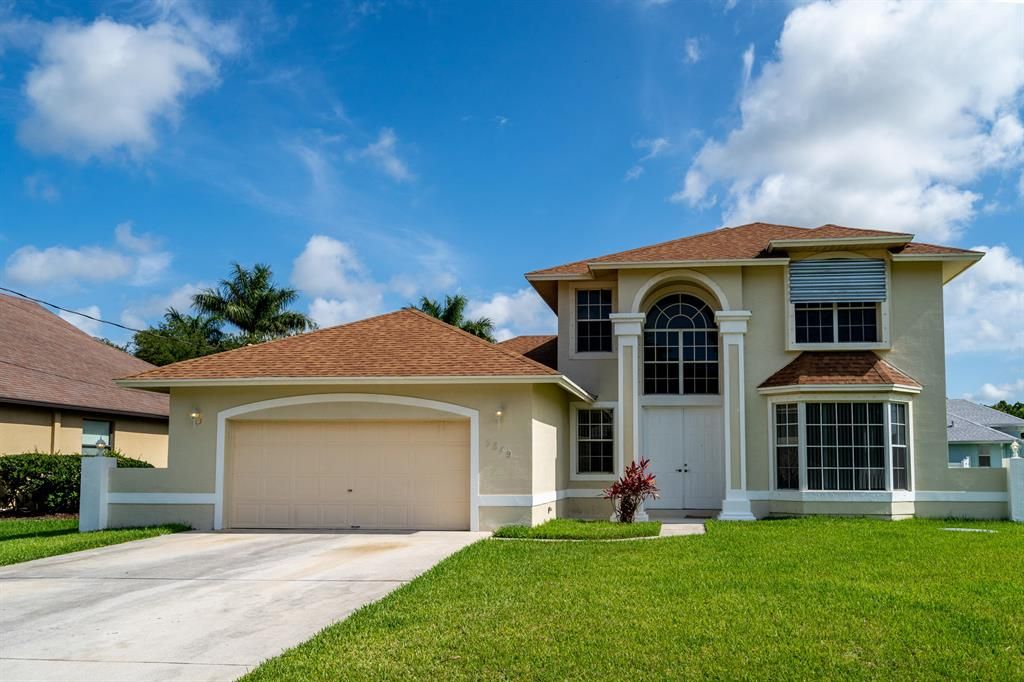 Photo of 5849 NW Leghorn Avenue, Port Saint Lucie, FL 34986 (MLS # R10715657)