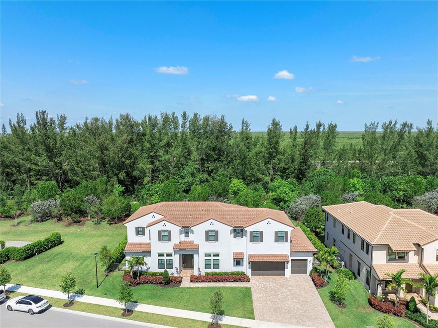 Stunning newer-built home in the desirable Parkland Bay community. Boasting 5 bedrooms and 5½ bathrooms. The first floor features elegant porcelain tile flooring, a spacious kitchen with a large quartz center island, matching counters, wood cabinets, and a gas stove. The home includes a convenient bedroom suite downstairs and four ensuite bedrooms upstairs. Enjoy the barista station adjacent to the kitchen. The living room showcases a decorative stone wall, adding charm. An oversized loft provides versatile living space. The laundry room is equipped with a sink, built-in cabinets, and countertops. The primary suite includes a large custom closet, while the primary bathroom offers double sinks, a Roman tub, and a generous shower. The fenced backyard provides room for a pool.