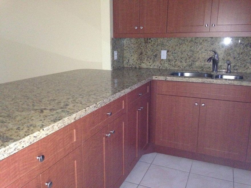 ALL AGES!! 1ST FLOOR! WASHER/DRYER INSIDE UNIT! WATER AND CABLE INCL IN RENT! SPACIOUS 2/2 WITH A DEN! FRESHLY PAINTED WHITE INTERIOR. TILE THRUOUT. KITCHEN HAS NEWER CABINETS AND GRANITE COUNTERS AND BACKSPLASH. LARGE GRANITE BREAKFAST COUNTER. WASHER/DRYER IN UNIT. FIRST FLOOR CONDO WITH BEAUTIFUL VIEWS OF THE GOLF COURSE.AND GREENERY  AREA TILED AND SCREENED PATIO. NEW IMPACT WINDOWS THRUOUT. HURRICANE SHUTTERS STILL THERE. WATER AND CABLE INCLUDED IN THE RENT. ALL AGES BUILDING. LOTS OF GUEST PARKING! EASY ACCESS TO I-95.