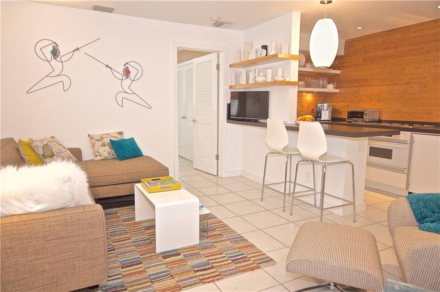 Your Winter Getaway is waiting. Tropical Garden is accurately named providing a lushly landscaped escape in a most convenient central location. This beautifully renovated light filled corner pied-a-terre (see pics) is only steps away from Holiday Park's tennis, jogging & more, along with Parker Playhouse, markets, restaurants & shopping.  Downtown, Las Olas, the Airport and Beaches are only moments away. Enjoy recently replaced AC, IMPACT WINDOWS/DOORS & Window Blinds. Amenities include Heated Salt Water Pool, Manicured Garden, Barbecue, Onsite Coin Laundry, Assigned Parking, Bicycle Rack, Internet and it's PET FRIENDLY. Must own for 12 months before leasing. The low, low maintenance fee makes this home better than a hotel room. Escape to South Florida's warm climate & vibrant lifestyle!