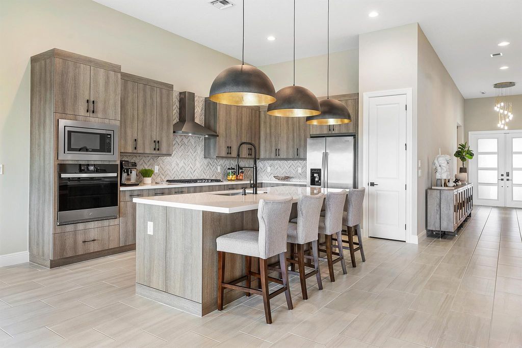 Photo of 12618 Nautilus Circle, Palm Beach Gardens, FL 33412 (MLS # R11112031)