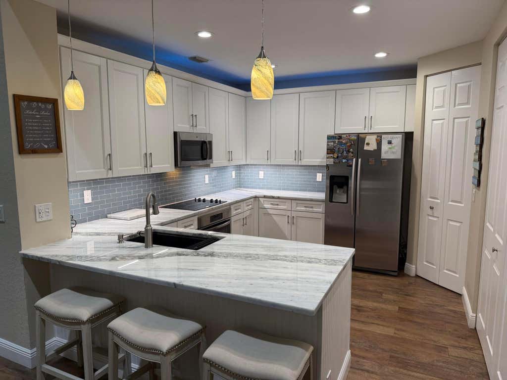 Photo of 2384 SW ISLAND CREEK Trail, Palm City, FL 34990 (MLS # B26065662)