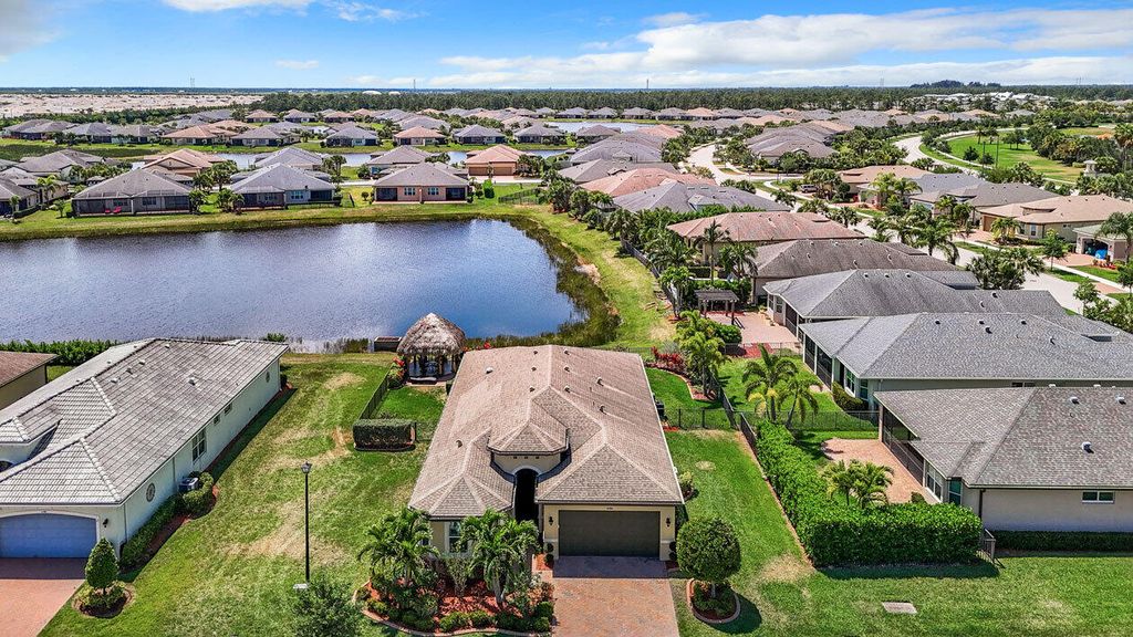 Photo of 11180 SW Lake Park Drive, Port Saint Lucie, FL 34987 (MLS # R10980082)