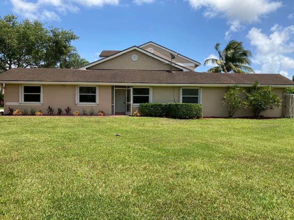 Photo of 1250 NW 51st Way, Deerfield Beach, FL 33442 (MLS # R10717956)