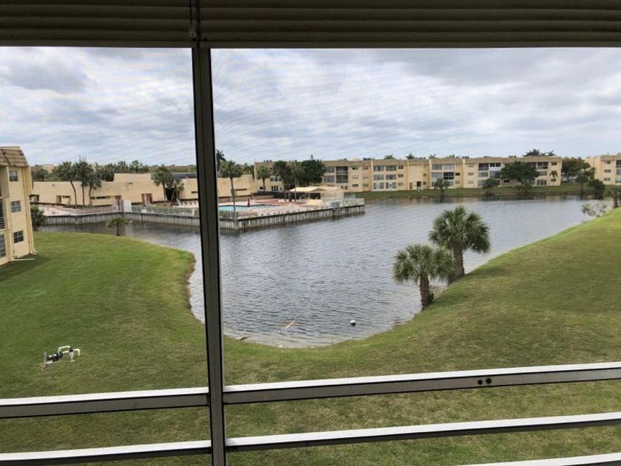 55+ COMMUNITY *CAPTIVATING VIEWS OF THE LAKE AND POOL, WALKING DISTANCE TO THE CLUB HOUSE AND TENNIS*GORGEOUS 2/2*UPGRADED NEW APPLIANCES - NEWER A/C UNIT*ACCORDION STORM SHUTTERS*ASSIGNED PARKING SPACE AND PLENTY OF GUEST PARKING. 55+ OVER COMMUNITY *CLOSE TO SHOPPING, RESTAURANTS AND BANKS* COMMUNITY TRANSPORTATION PROVIDED* A WONDERFUL HOME TO ENJOY SOUTH FLORIDA LIVING MAKES THIS LIGHT, BRIGHT AND AIRY * MOVE-IN READY,* PLENTY OF GUEST PARKING* NICE, QUIET NEIGHBORHOOD *LOTS OF ACTIVITIES* 55 COMMUNITY. Association will verify income and credit report score of a minimum 700 SCORE.